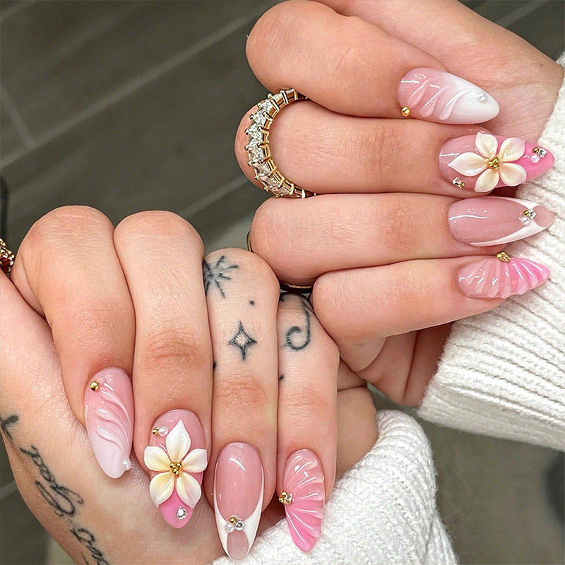 Nail art set with filigree flower patterns and sparkling accents Acalora
