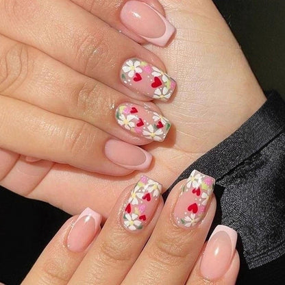 Artificial nails with romantic heart design and fine accents Acalora