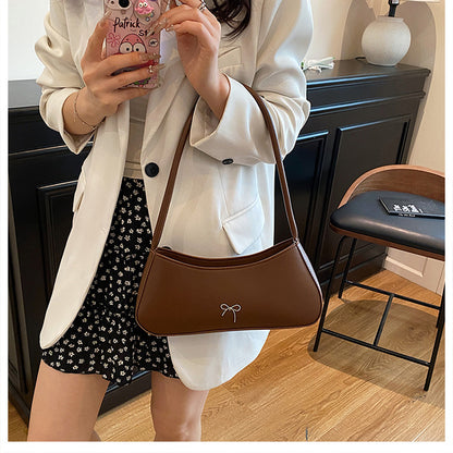 Elegant Curved Handbag Acalora