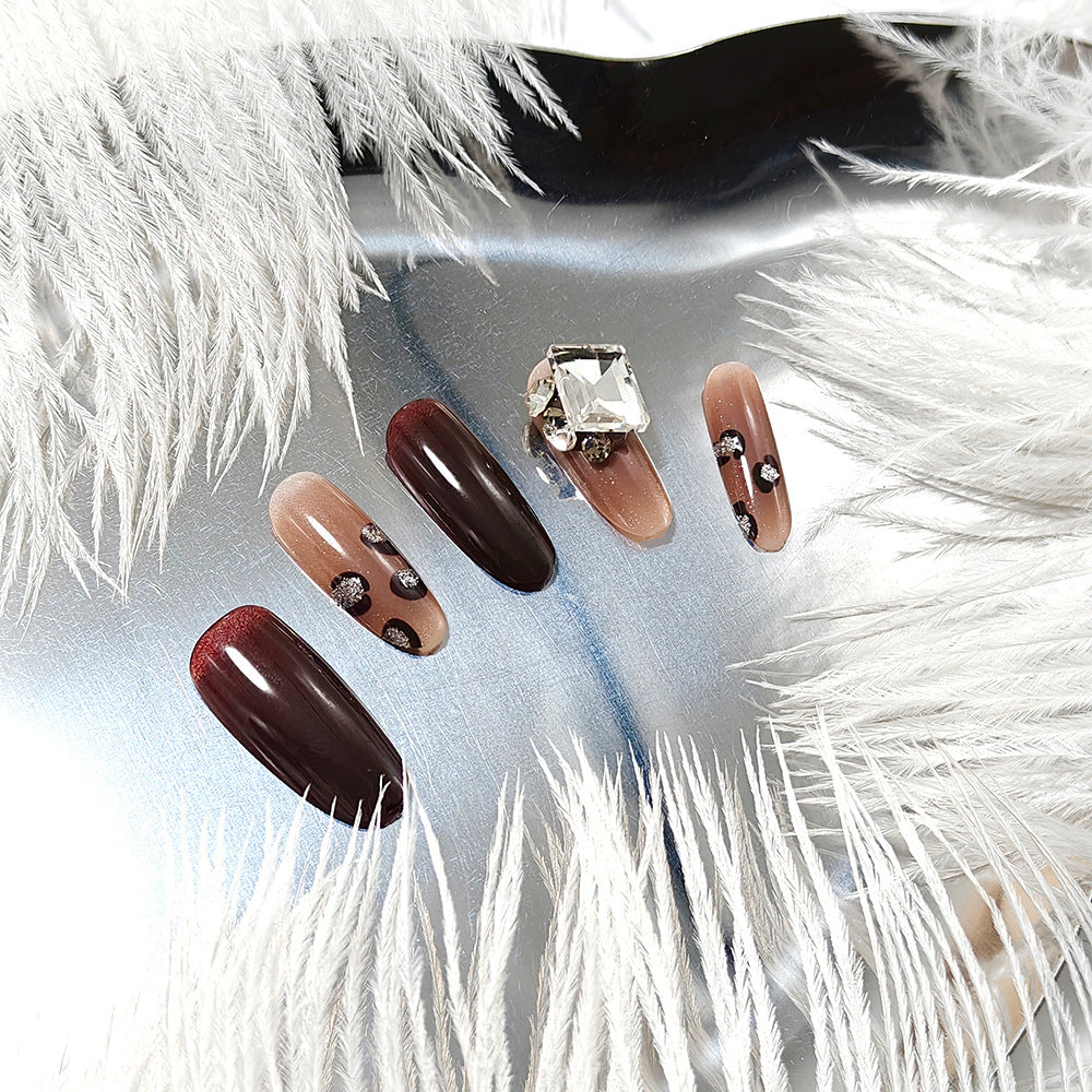 Luxury artificial nails with elegant rhinestone applications Acalora