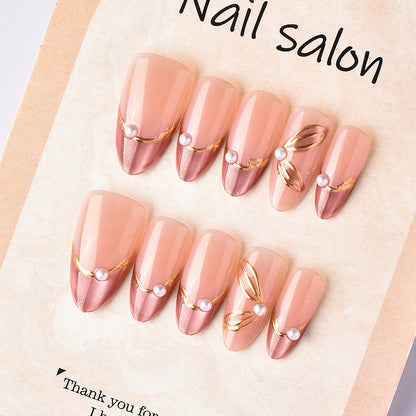 Nail set with glamorous golden accents and elegant design Acalora
