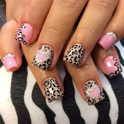 Glamorous artificial nail collection with animal motif and crystal embellishments Acalora