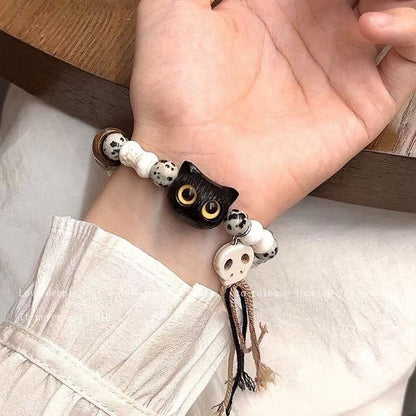 Whimsical Cat and Bone Charm Bracelet Acalora