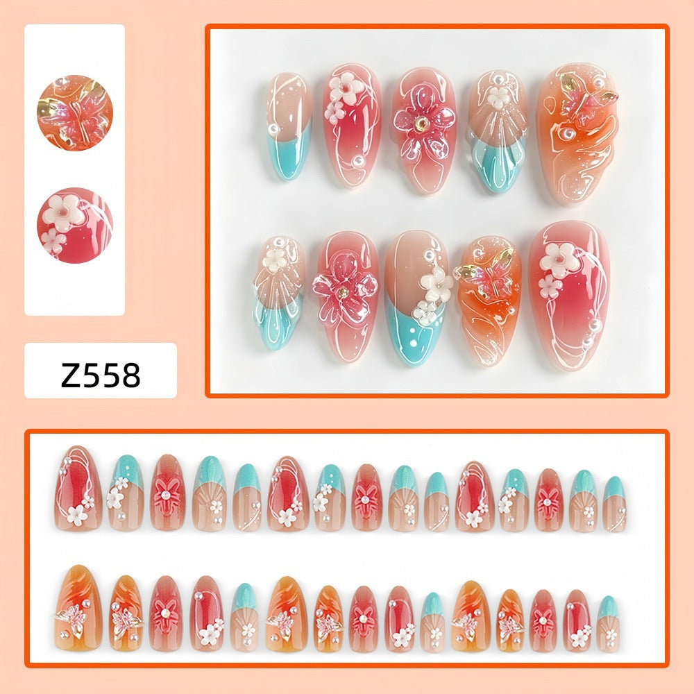 Artificial nail set with floral accents and glittering 3D applications Acalora
