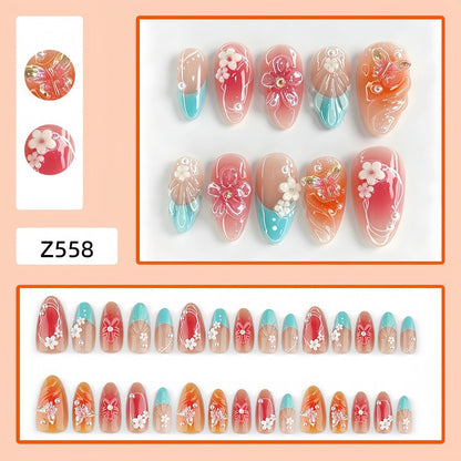 Artificial nail set with floral accents and glittering 3D applications Acalora