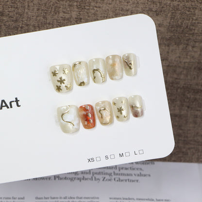 Elegant Press-On Nail Art Set with Unique Metallic Designs Acalora