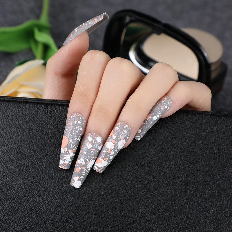 Artistic splatter design artificial nails Acalora