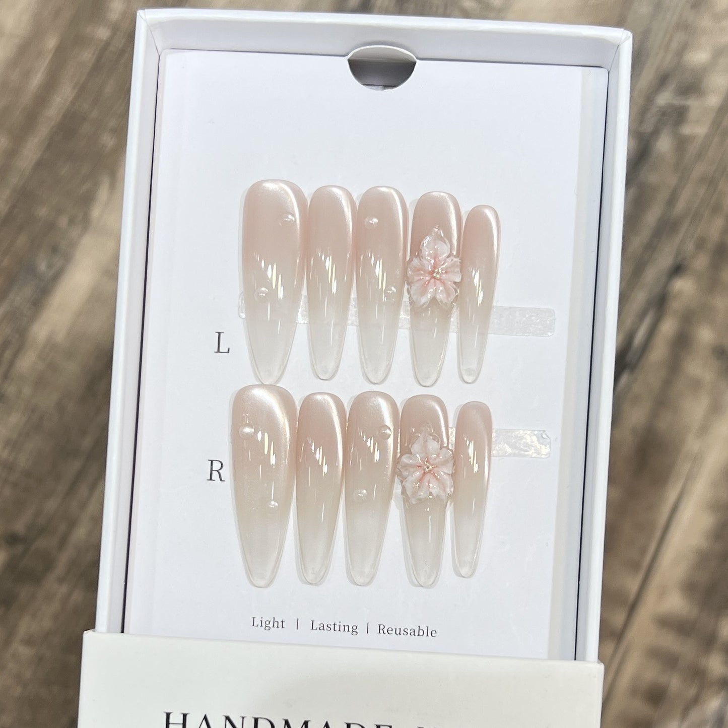 Elegant Stiletto Nail Extensions with Floral Accents Acalora