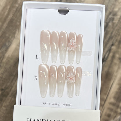 Elegant Stiletto Nail Extensions with Floral Accents Acalora