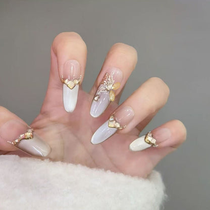 Glamorous art nails with elegant golden details Acalora