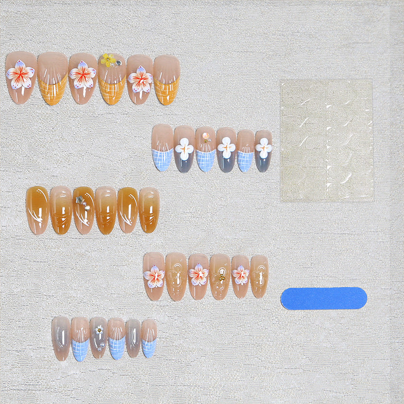 Acrylic nail set with aesthetic floral accents and gloss finish Acalora