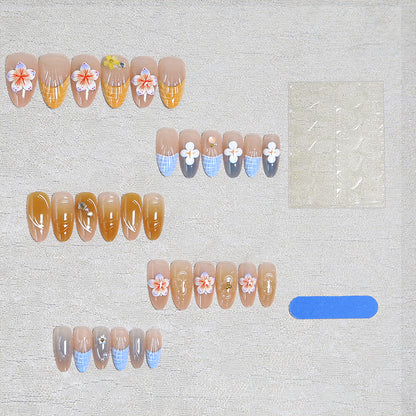 Acrylic nail set with aesthetic floral accents and gloss finish Acalora
