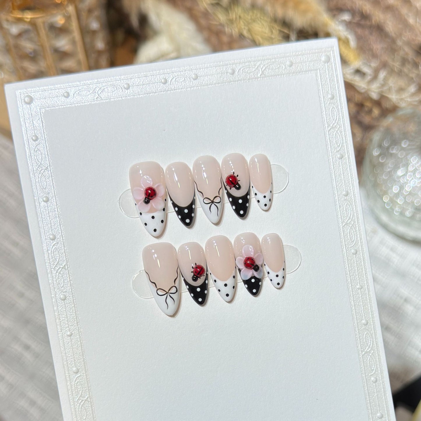 Artistic Stiletto Press-On Nail Set with Floral and Insect Designs Acalora
