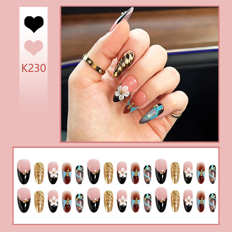 Artificial nail set with filigree floral decorations and glamorous accents Acalora