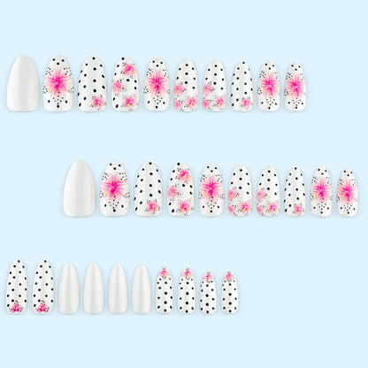 Artificial nail set with floral accents and polka dots Acalora