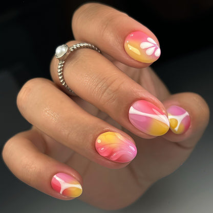 Artificial nails with floral design and elegant color gradients Acalora