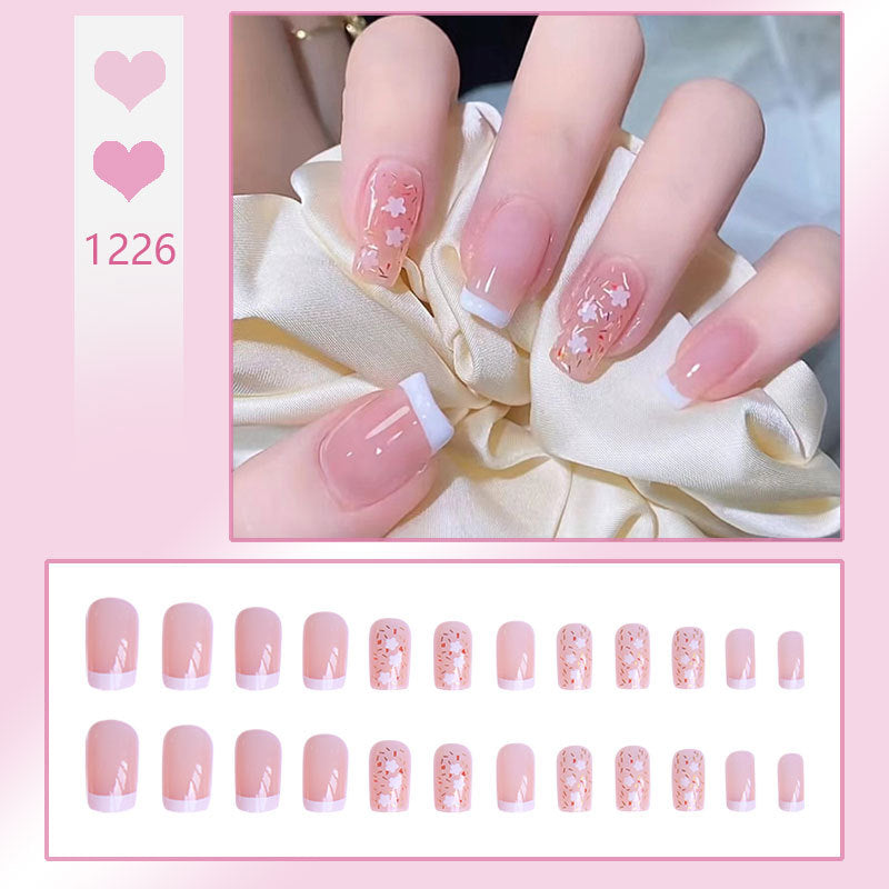 Nail art set with floral decorations and elegant French design Acalora