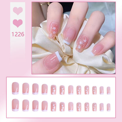 Nail art set with floral decorations and elegant French design Acalora