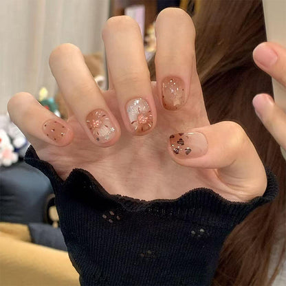 Artificial nail set with sparkling glitter accents Acalora