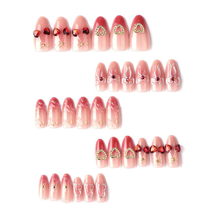 Decorative artificial nails with romantic heart and bow motifs Acalora