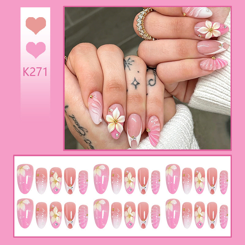 Nail art set with filigree flower patterns and sparkling accents Acalora