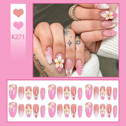 Nail art set with filigree flower patterns and sparkling accents Acalora