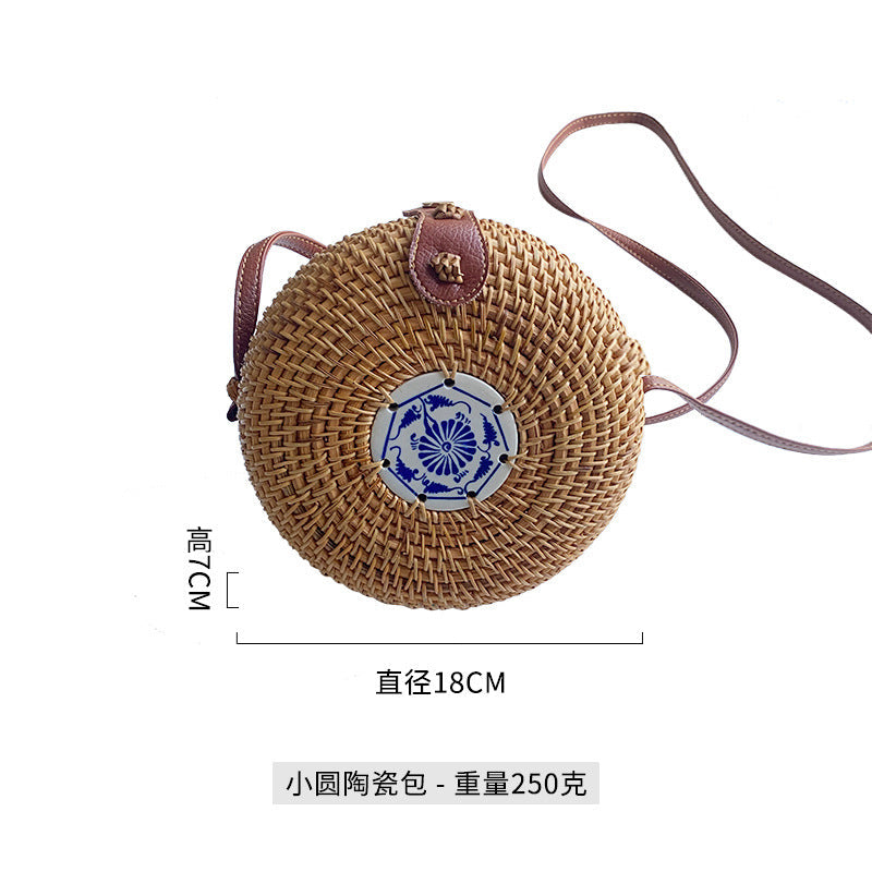 Women's round basket bag with unique ceramic detail Brehn