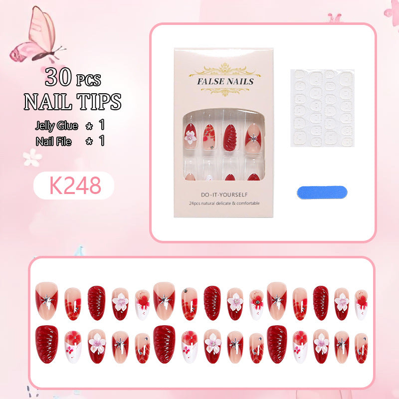 Luxury designed artificial nails with flower accents Acalora