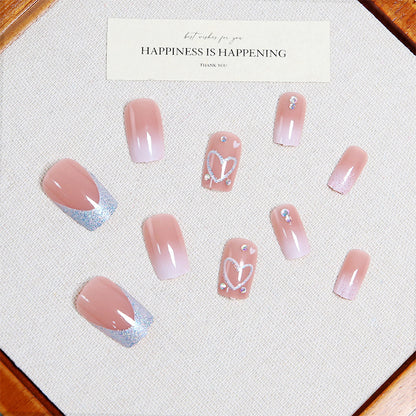 Artificial nail set with sparkling heart and glitter motifs Acalora