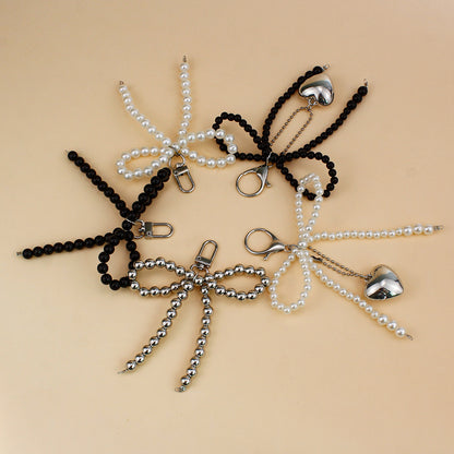 Elegant Pearl Bow Brooch Acalora