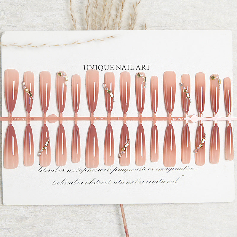 Artificial nail set with elegant ombre effect and glamorous embellishments Acalora