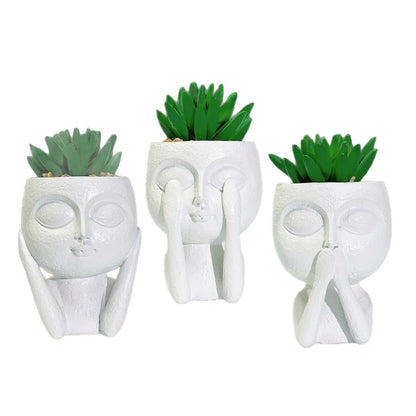 Plant pot with face motif Acalora