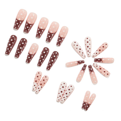 Artificial nails in the popular polka dot design Acalora