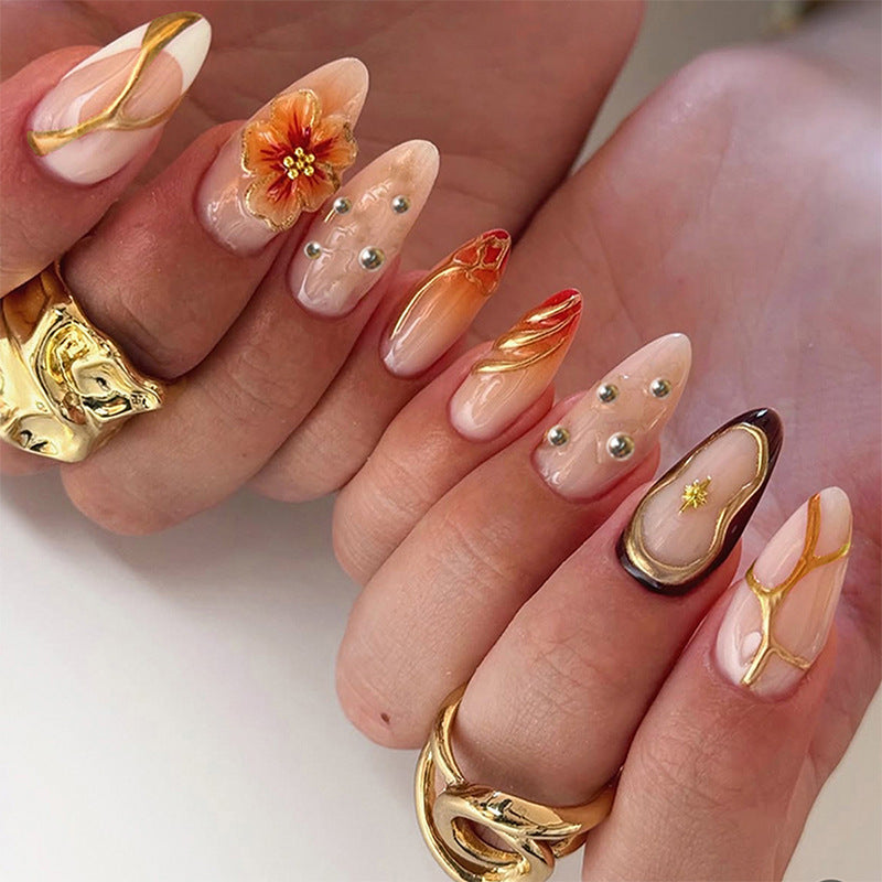 Nail art set with floral accents and glitter elements Acalora