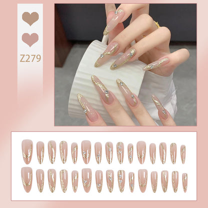 Artificial nail set with elegant gold design and sparkling applications Acalora