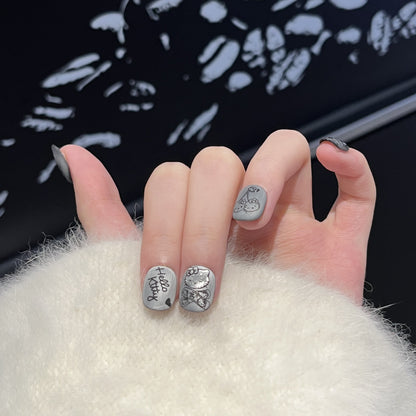 Artistic Press-On Nail Set with Whimsical Character Designs Acalora