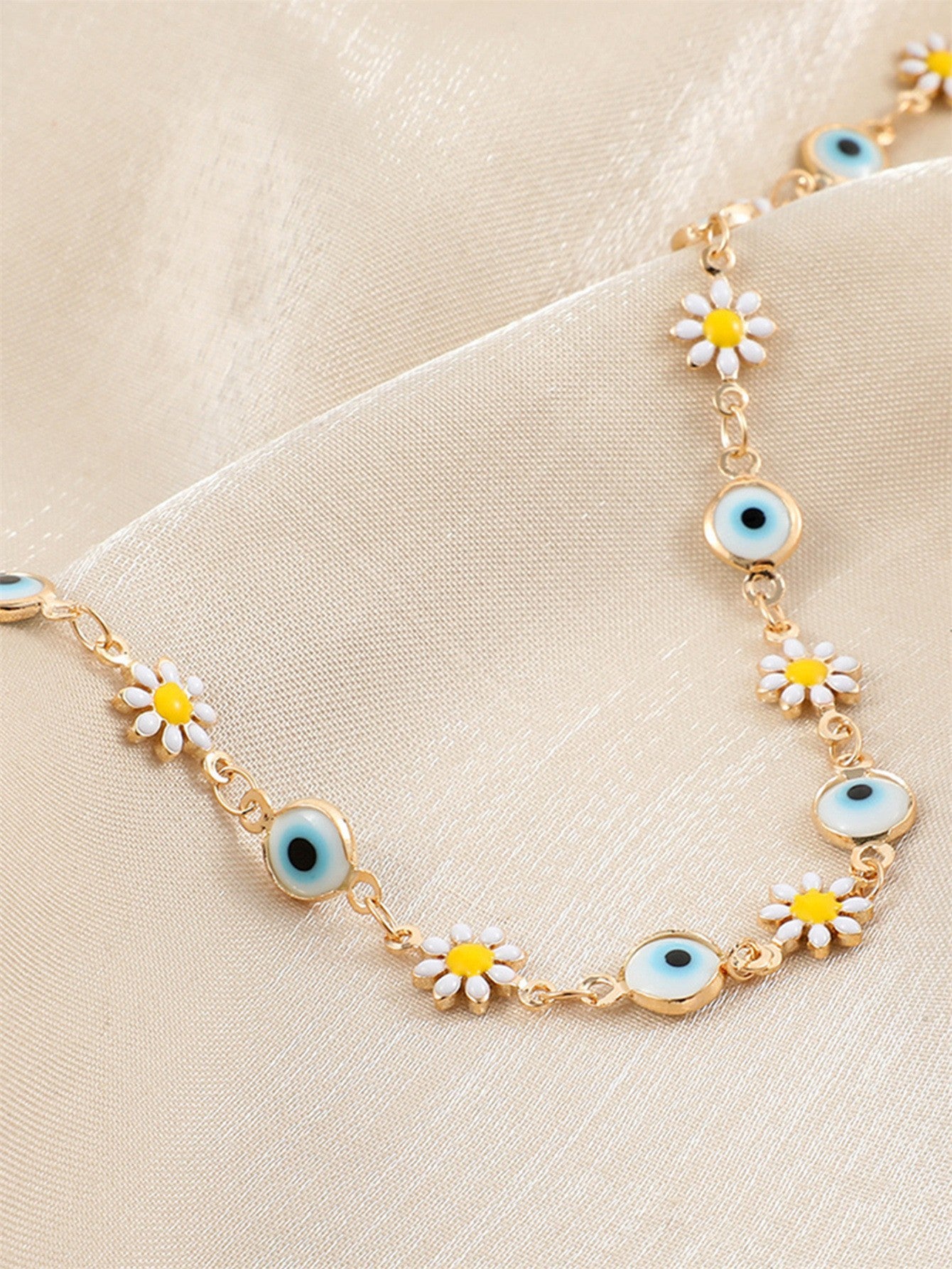 Flower and Eye Charm Bracelet Acalora