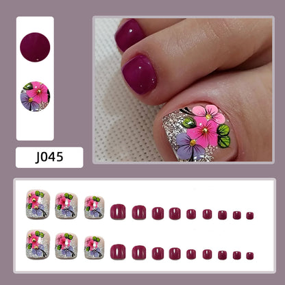 Artificial nails with floral motifs and glitter accents Acalora