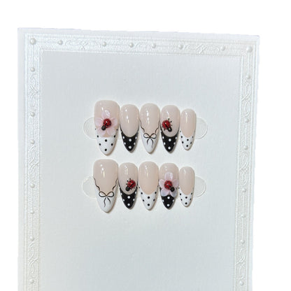 Artistic Stiletto Press-On Nail Set with Floral and Insect Designs Acalora