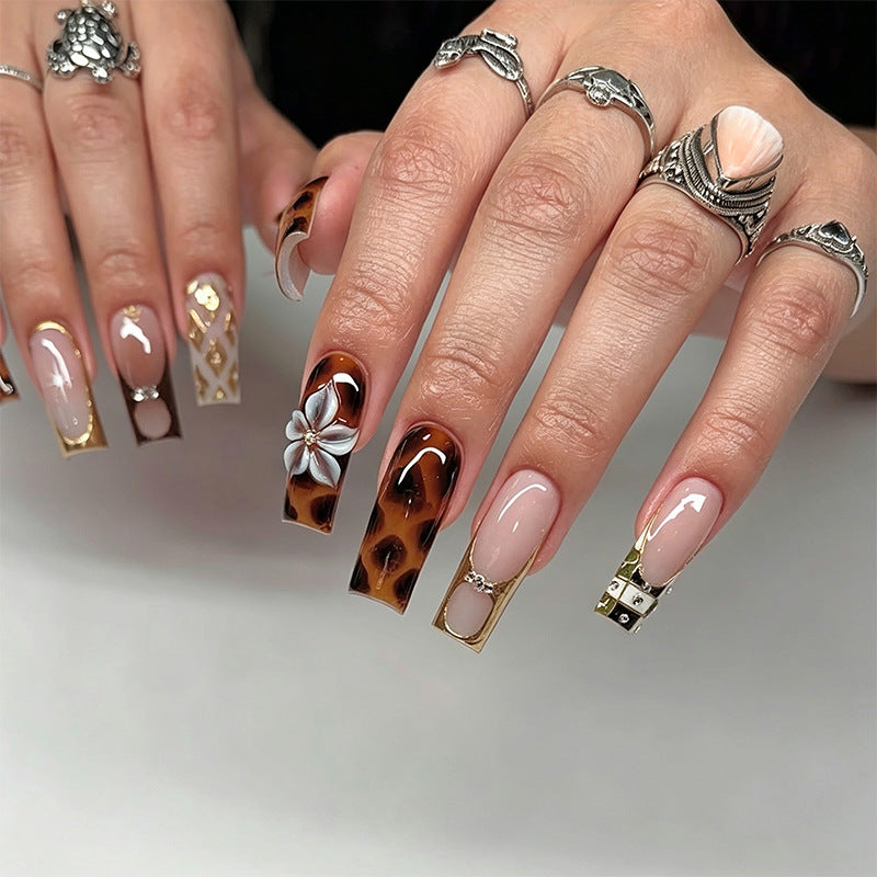 Acrylic nail set with glamorous decorations and elegant designs Acalora