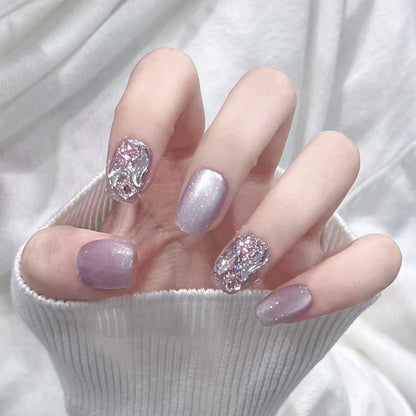 Artificial nail set with glitter and metallic effects Acalora