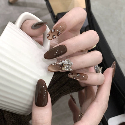 Luxury artificial nails with elegant rhinestone applications Acalora