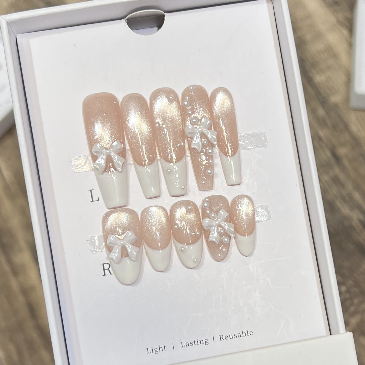 Decorative Long Press-On Nail Set with Bow and Pearl Accents Acalora