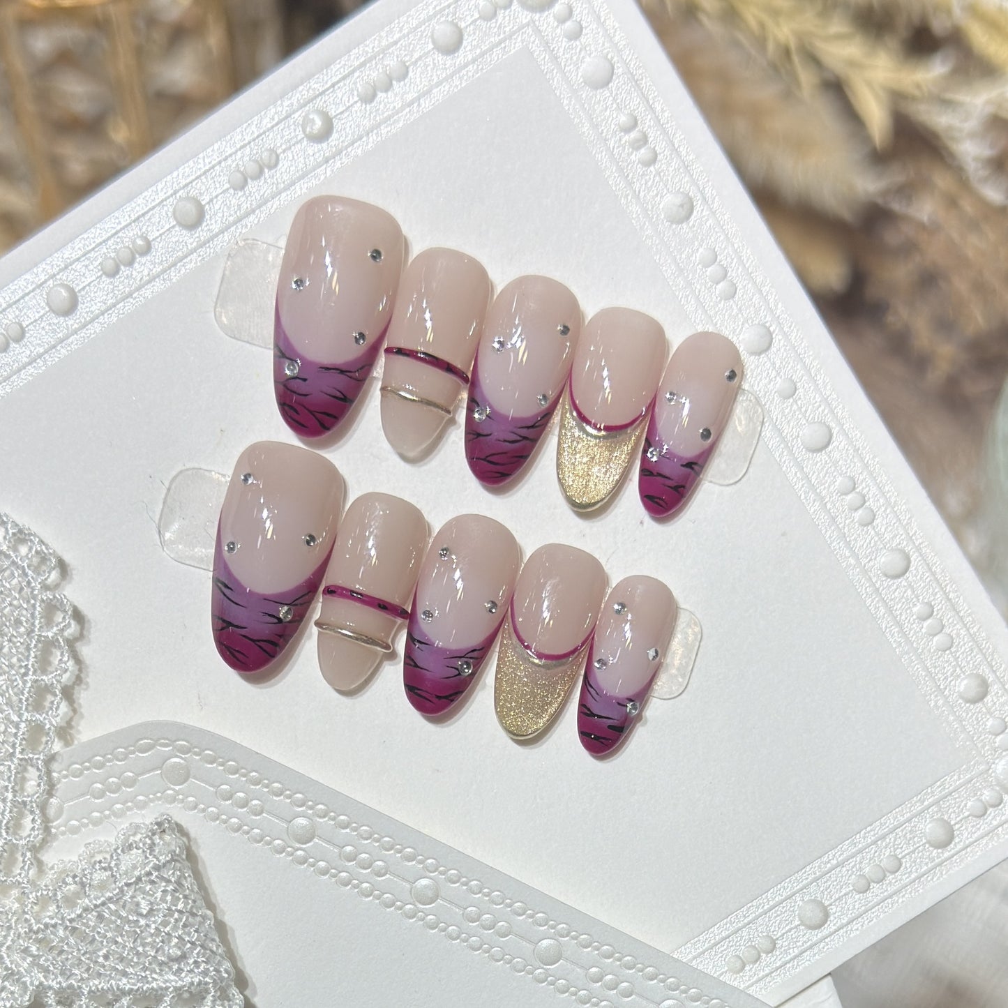 Artistic Stiletto Press-On Nail Set with Rhinestone Accents Acalora