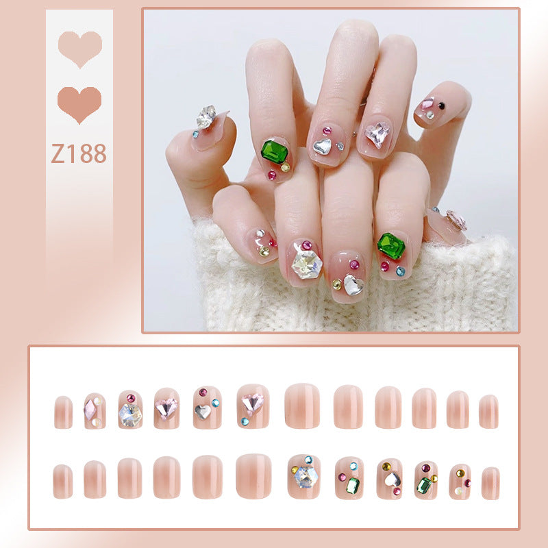 Acrylic nail set with sparkling 3D applications and beautiful heart designs Acalora
