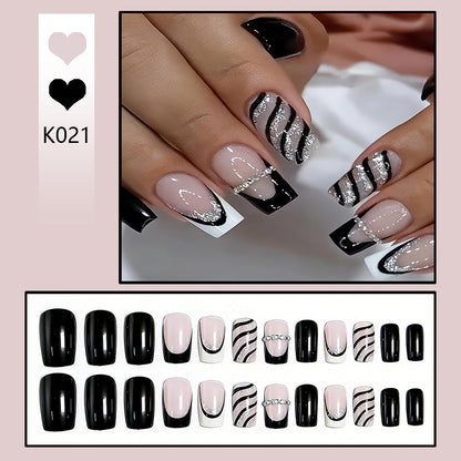 Artificial nail set with glamorous glitter and stripe designs Acalora