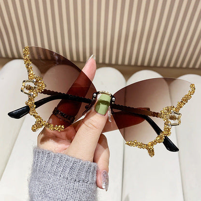 Women's extravagant sunglasses with sparkling butterfly design Kalsten