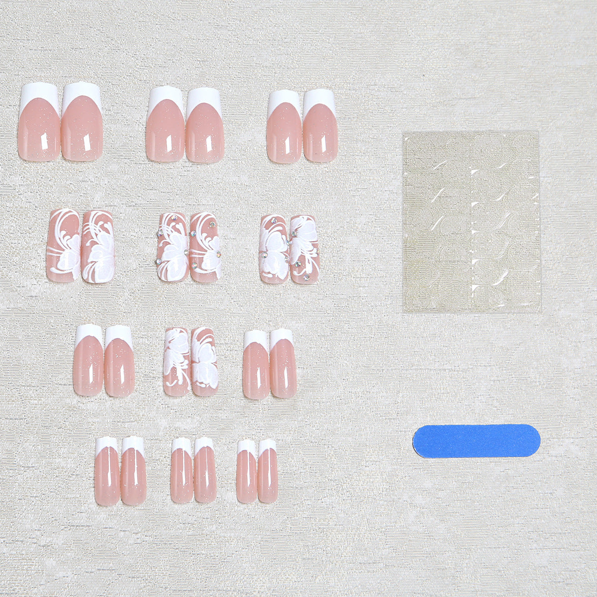 Artificial nail set with delicate flower and glitter decoration Acalora