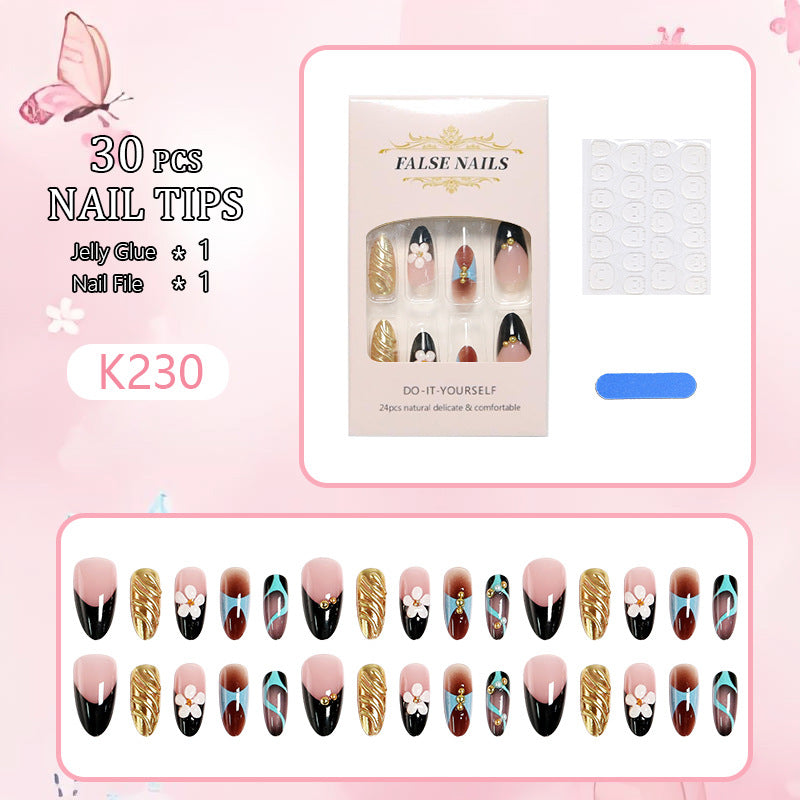 Artificial nail set with filigree floral decorations and glamorous accents Acalora