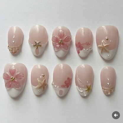 Artificial nail set with floral and maritime designs Acalora